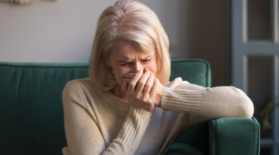 Una dona plorant per por a la mort (Getty images)