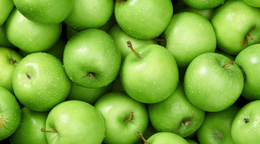 Nombroses pomes verdes (Getty images)