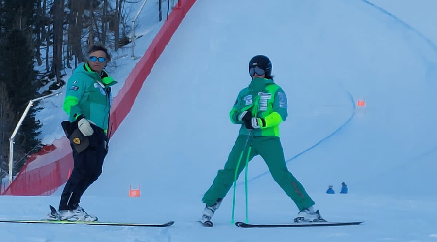 Jordina Caminal, amb l'entrenador Guido Paci a Passo San Pellegrino (FAE)