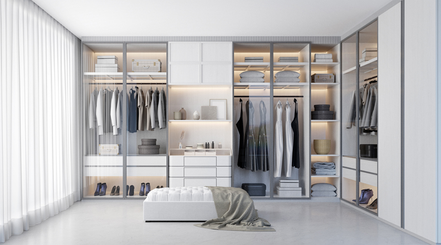 Armaris vestidors en una habitació (AMIC)