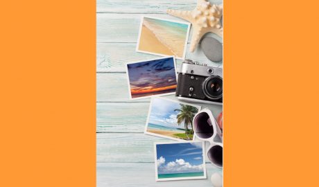 Una càmera i unes fotografies d'un viatge