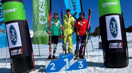 El podi masculí, amb Calvo segon